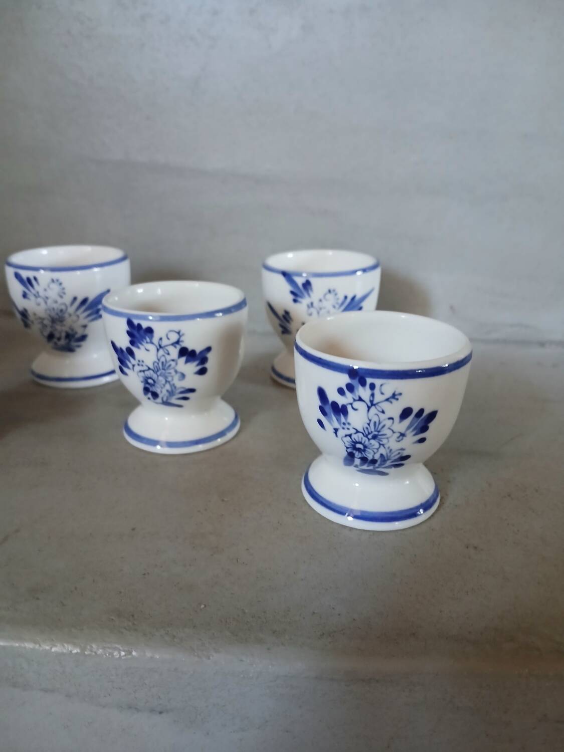 7 antique egg cups