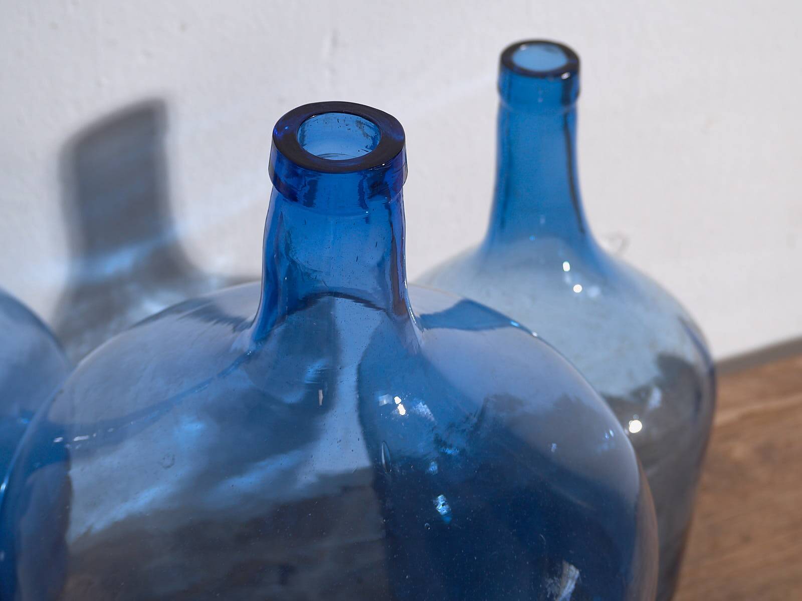 Antique blue demijohns (circa 1920). 3-piece set #1