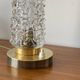 Vintage tulip-shaped table, desk, and bedside lamp with antique glass shade and brass base