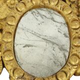Petit miroir ancien patiné en bois doré du XIXe siècle