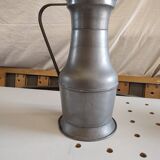 Large copper pitcher and old tin