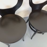 Set of 4 vintage Mouette chairs by Baumann in black wood from the 1960s.