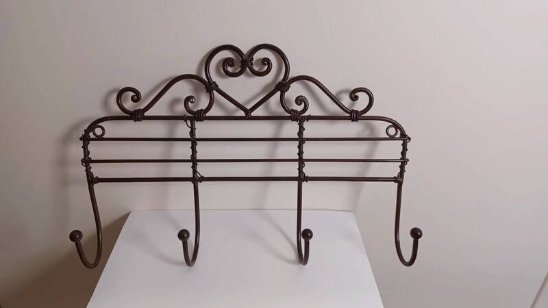 Brown metal wall coat rack