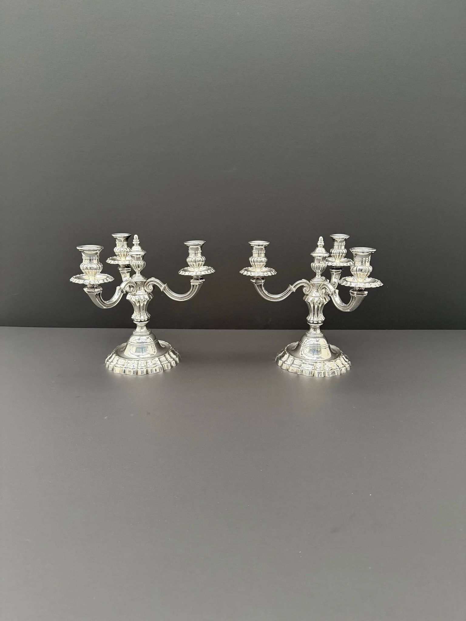 Pair of Chrysalia three-light silver-plated metal candlesticks