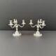 Pair of Chrysalia three-light silver-plated metal candlesticks