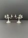 Pair of Chrysalia three-light silver-plated metal candlesticks