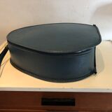 Suitcase has an air hostess hat