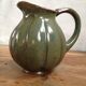 Green enamelled sandstone pitcher