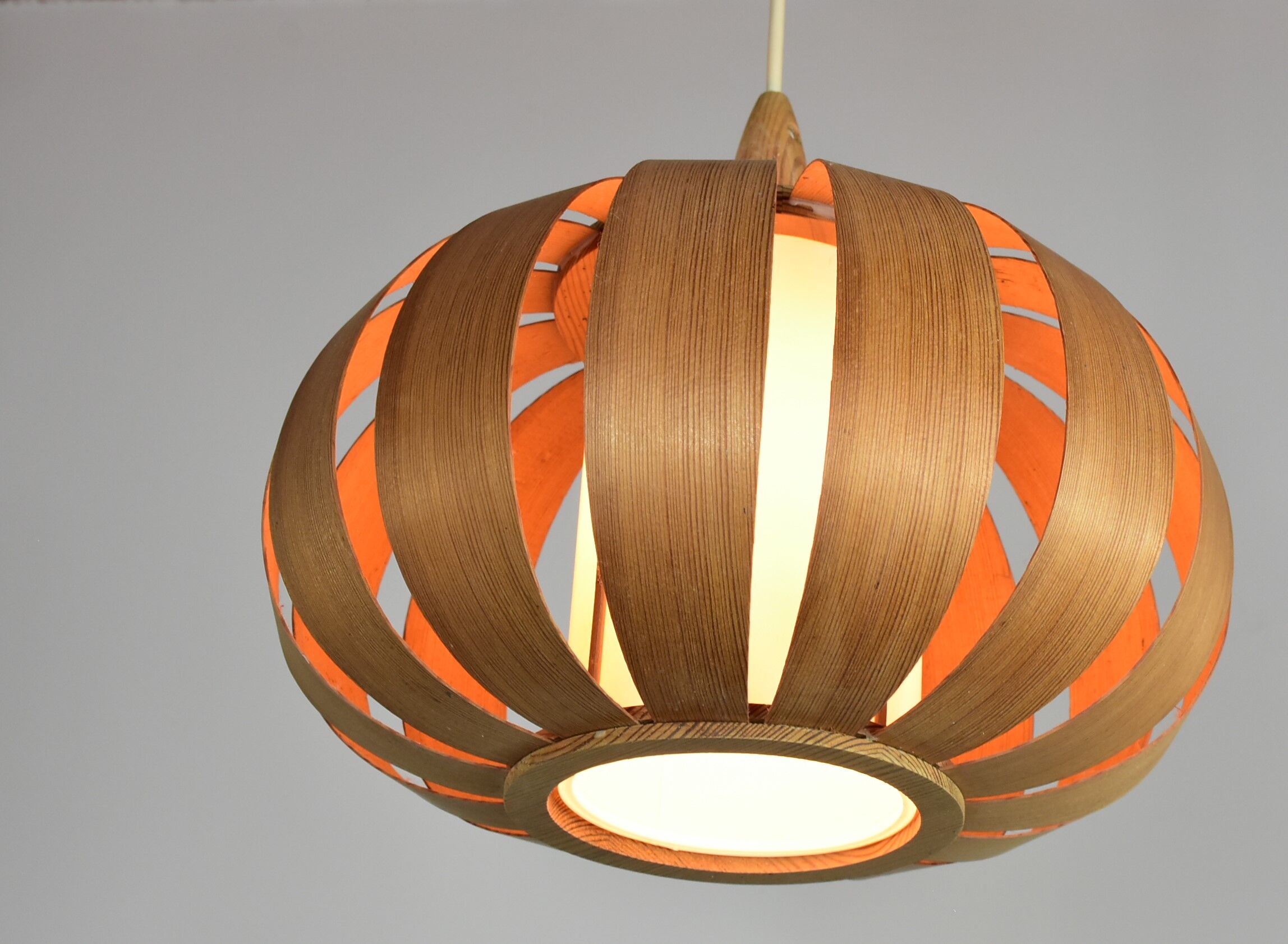 Scandinavian-style wooden pendant light.