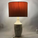 White ceramic table lamp with half lampshade