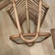 Rattan and frosted glass end table with magazine rack