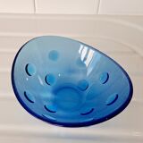 Empty cup blue glass pocket