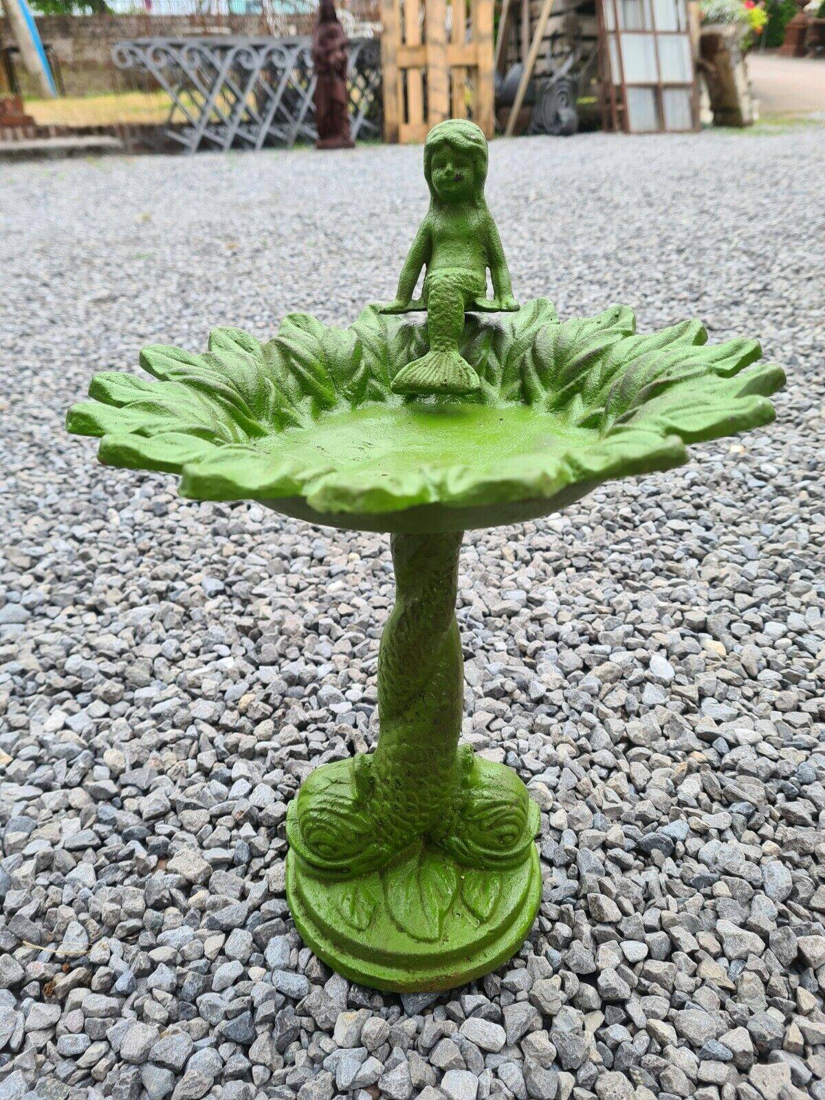 Cast iron birdbath with a mermaid