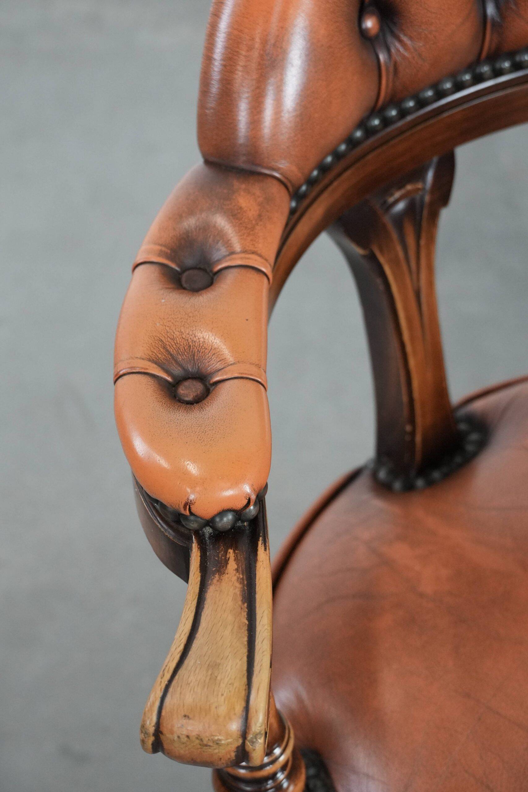 Classic and timeless cow leather and wooden Chesterfield office chair