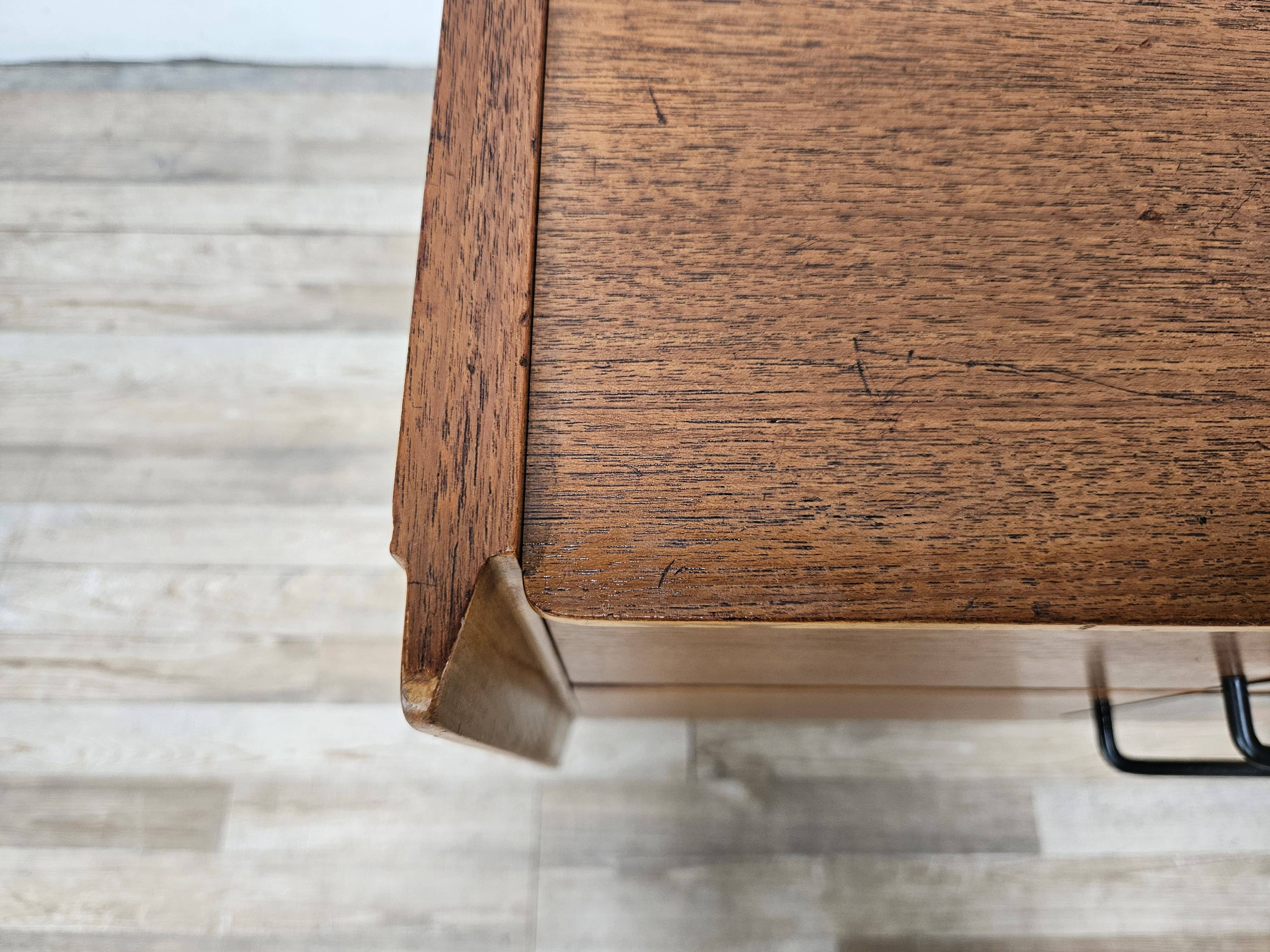 1960s walnut chest of drawers with iron and brass details