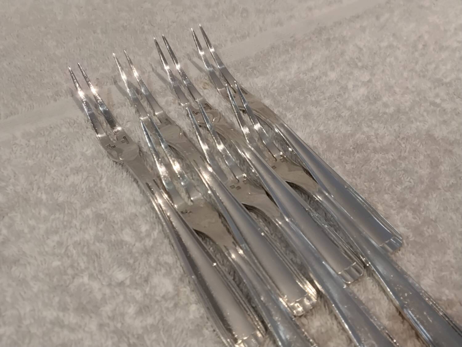 7 silver-plated metal snail forks by silversmith Alfenide, Paris pattern
