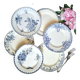 Old mismatched flat plates made of ironstone earthenware.