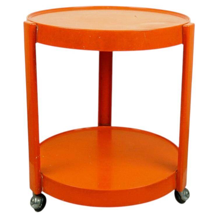Circular orange Italian Space Age plastic trolley