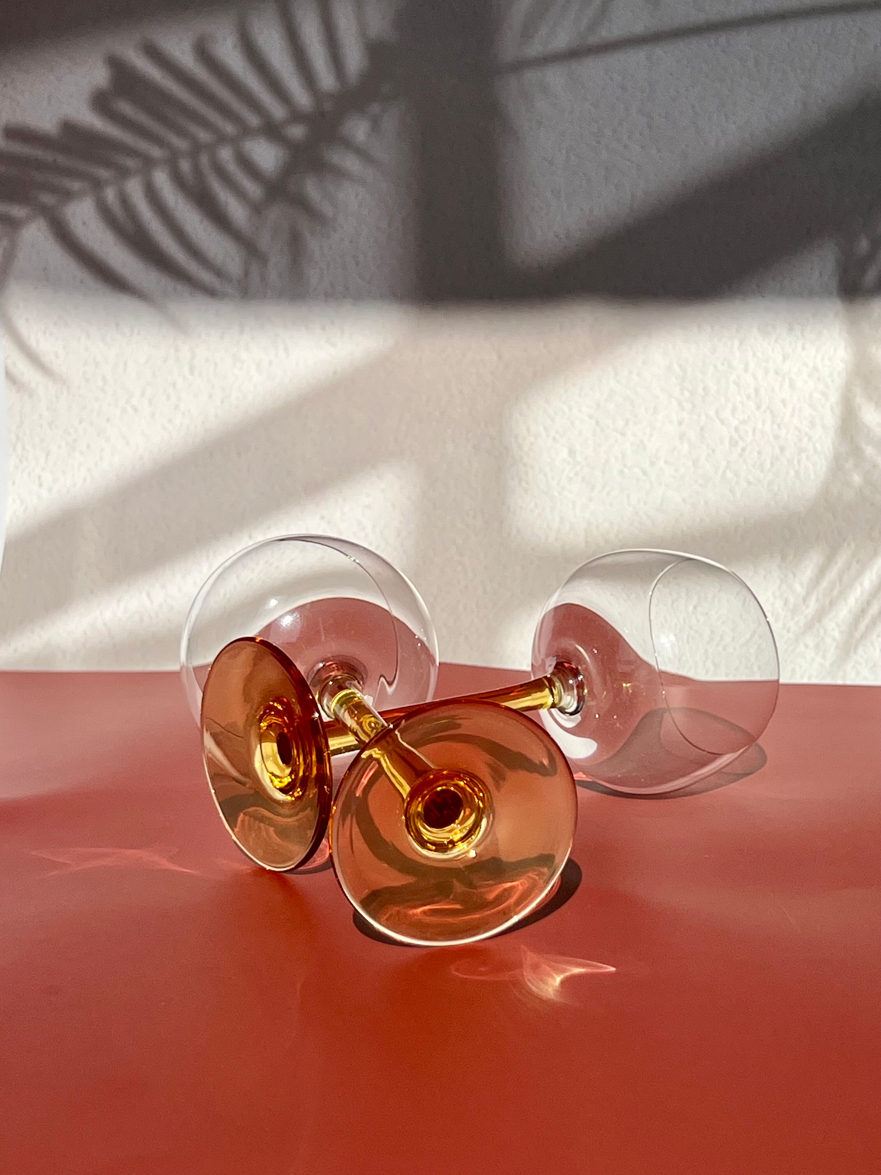 Pair of glass balloon vintage style Luminarc foot rod orange