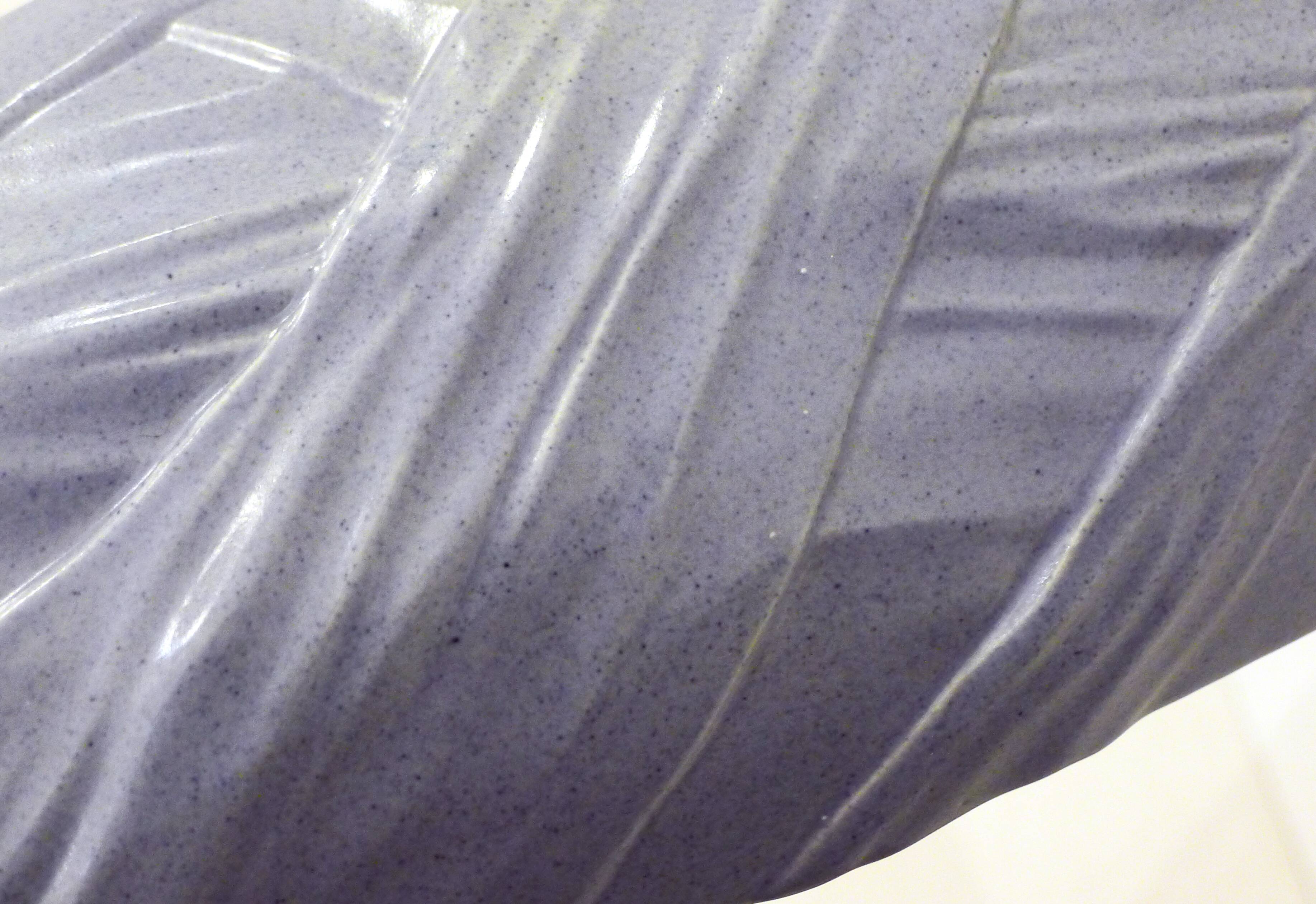 Purple vase, draped ribbons in relief