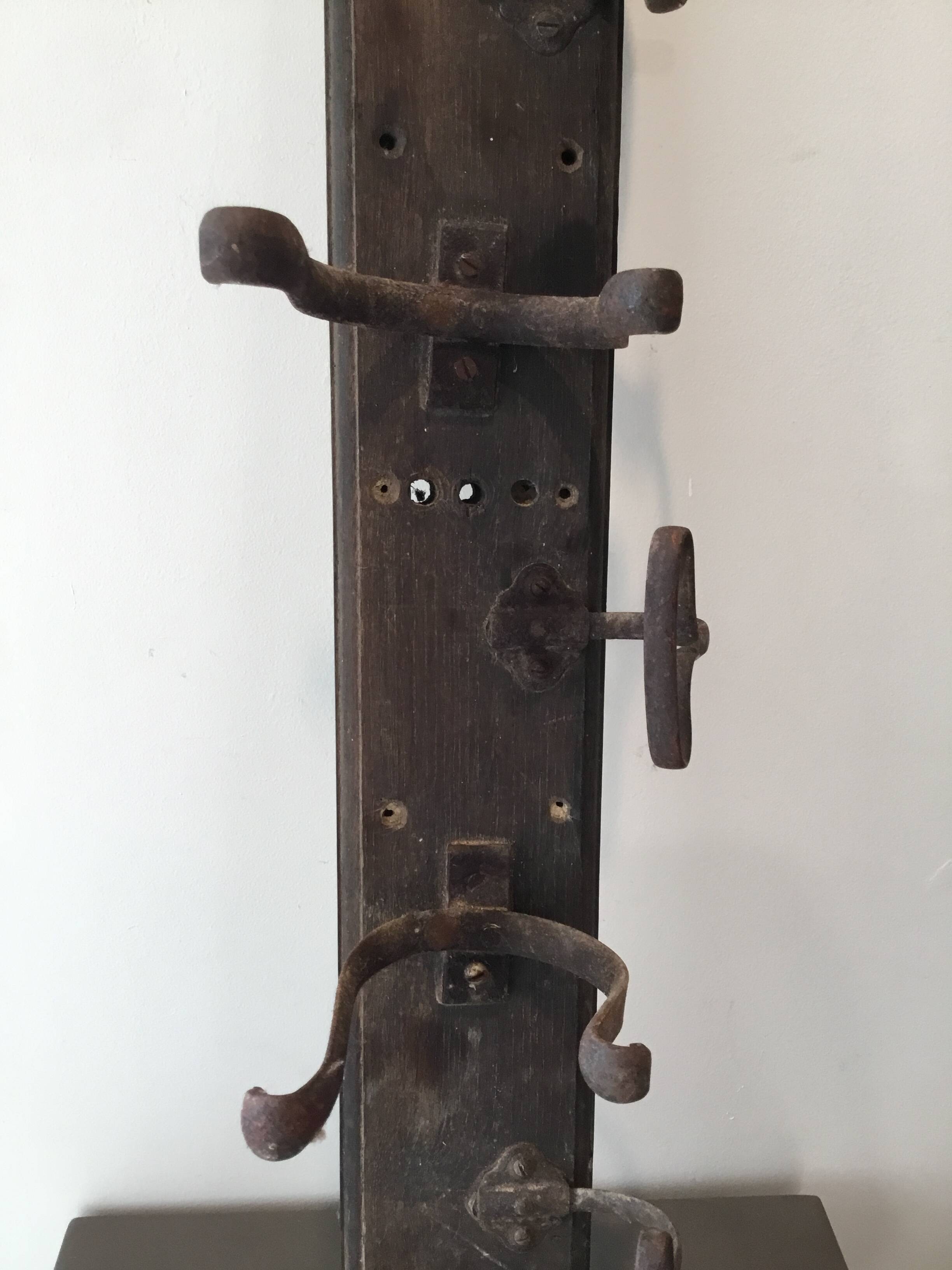 Antique coat rack with hooks