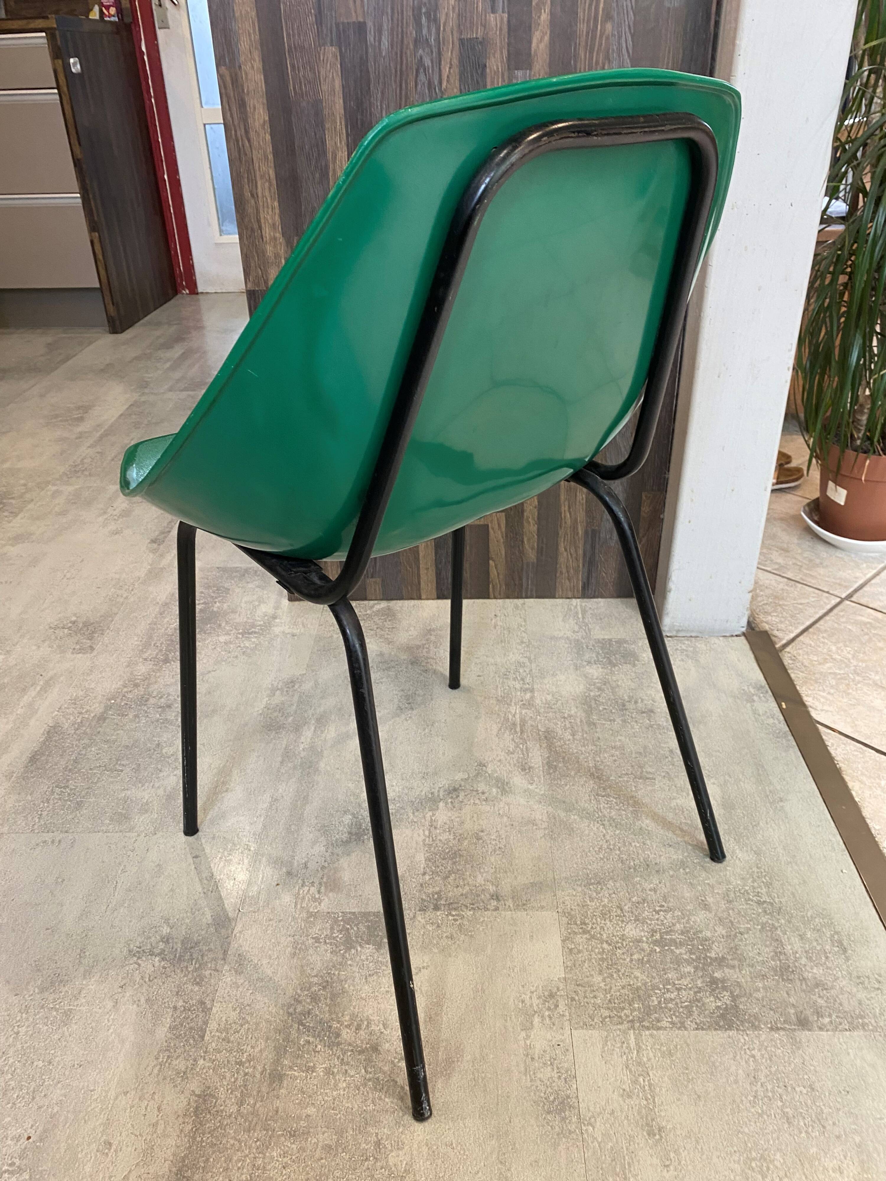 A shell chair by Pierre Guariche for Meurop in vintage green from the 1960s.