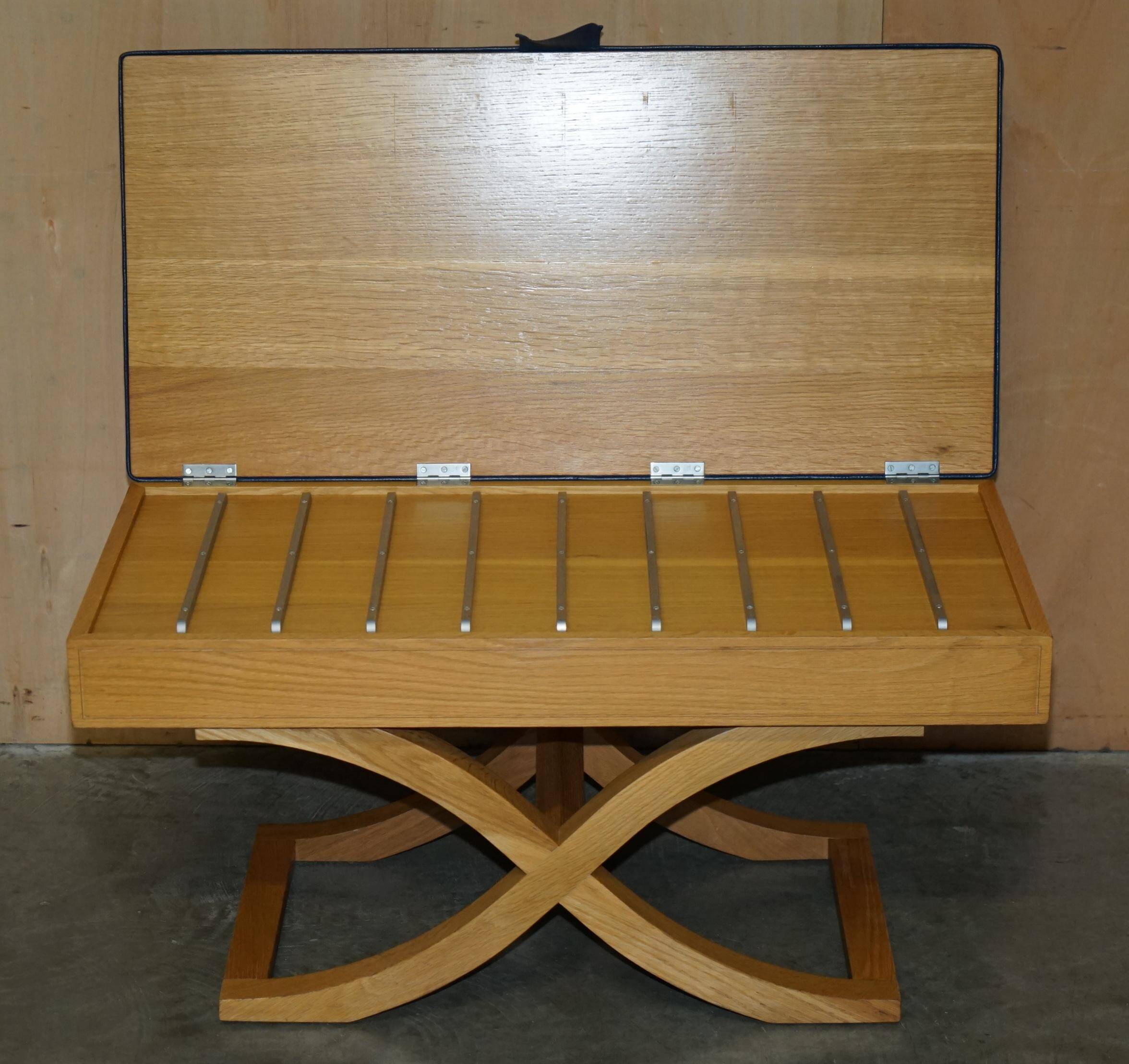 David Linley Hall bench in ostrich leather and satinwood with storage.