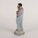 Ancient sculpture of Saint Joseph in a display case, Italy 1900s, polychrome porcelain.