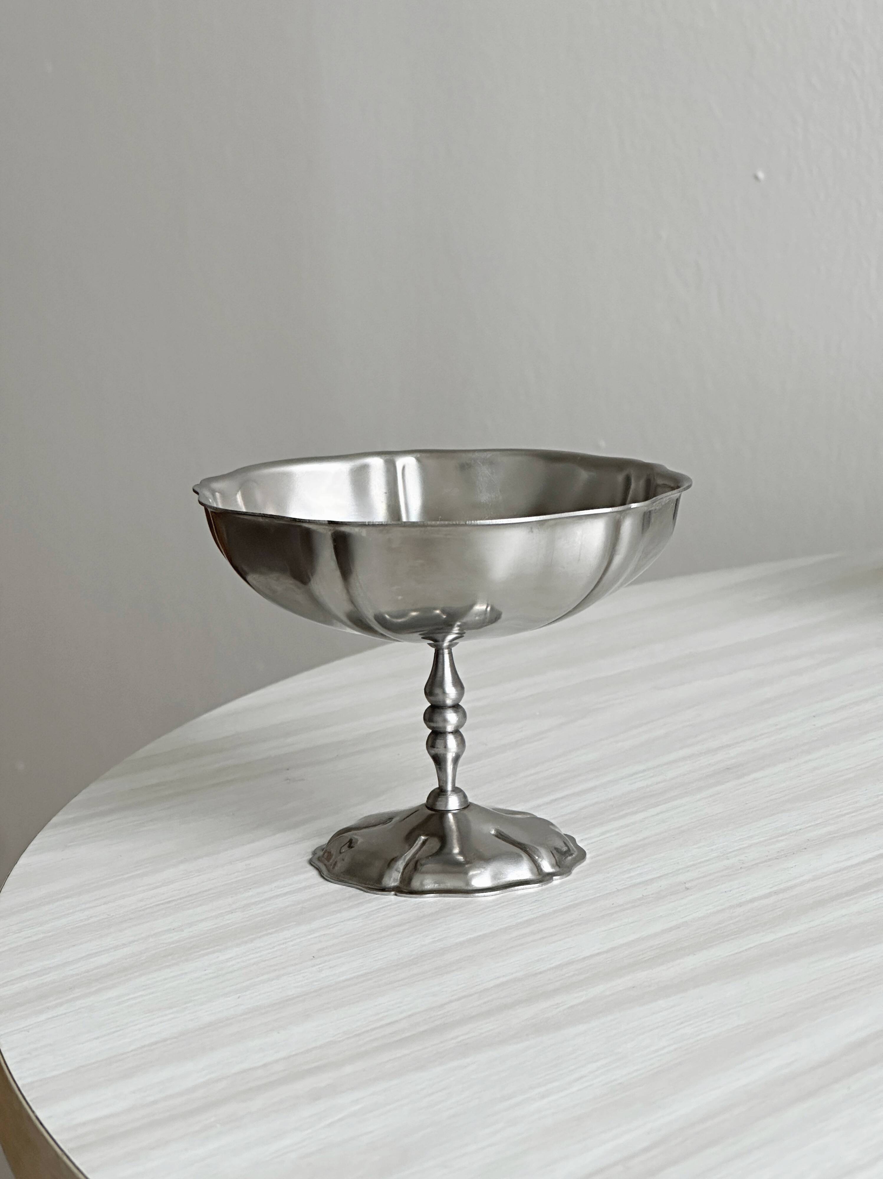 8 very large stainless steel footed bowls