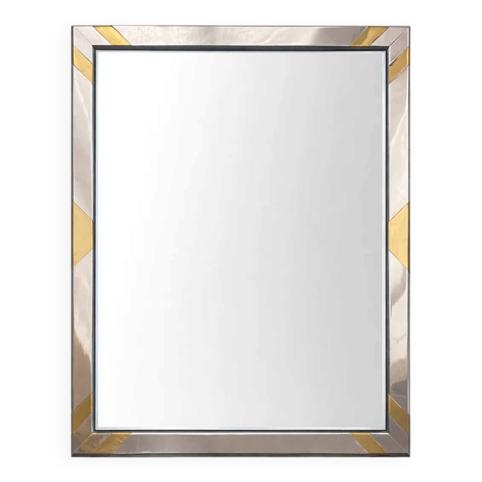 Faceted modernist wall mirror in steel and brass, geometric mixed metal frame 1970s.