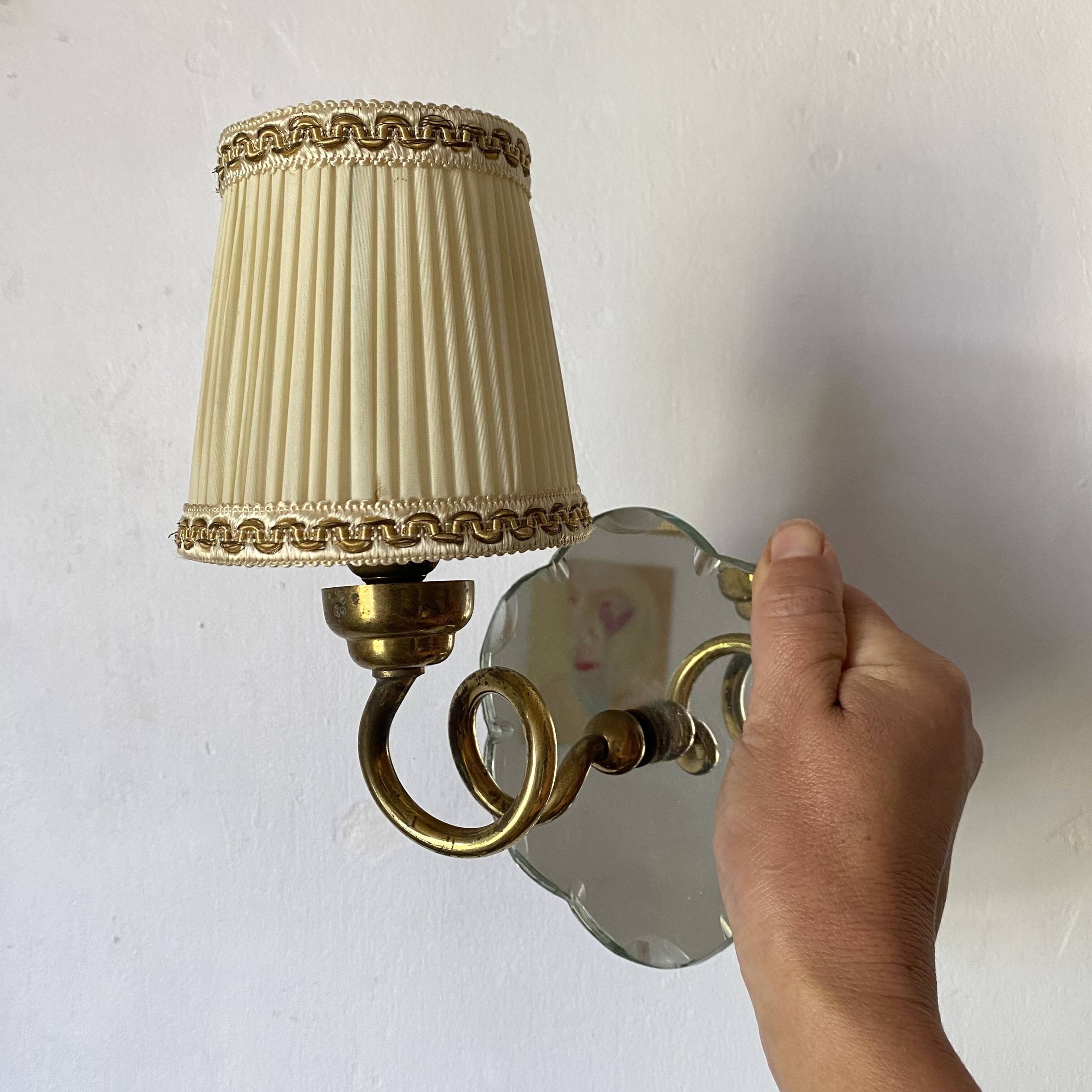 Pair of mirror and brass wall lights from the 50s and 60s