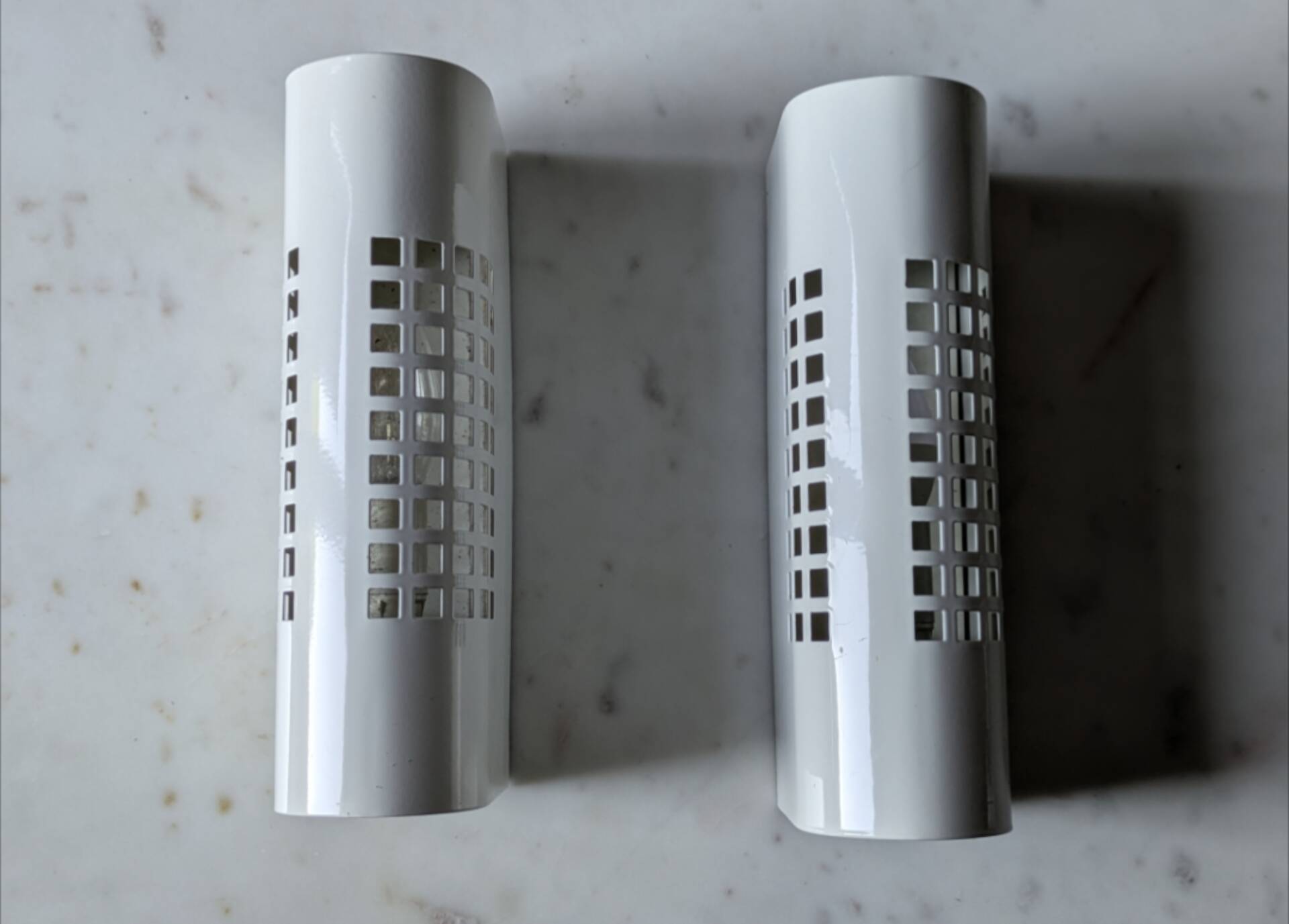 Pair of vintage wall sconces in sheet metal/Perriand/Mategot style.