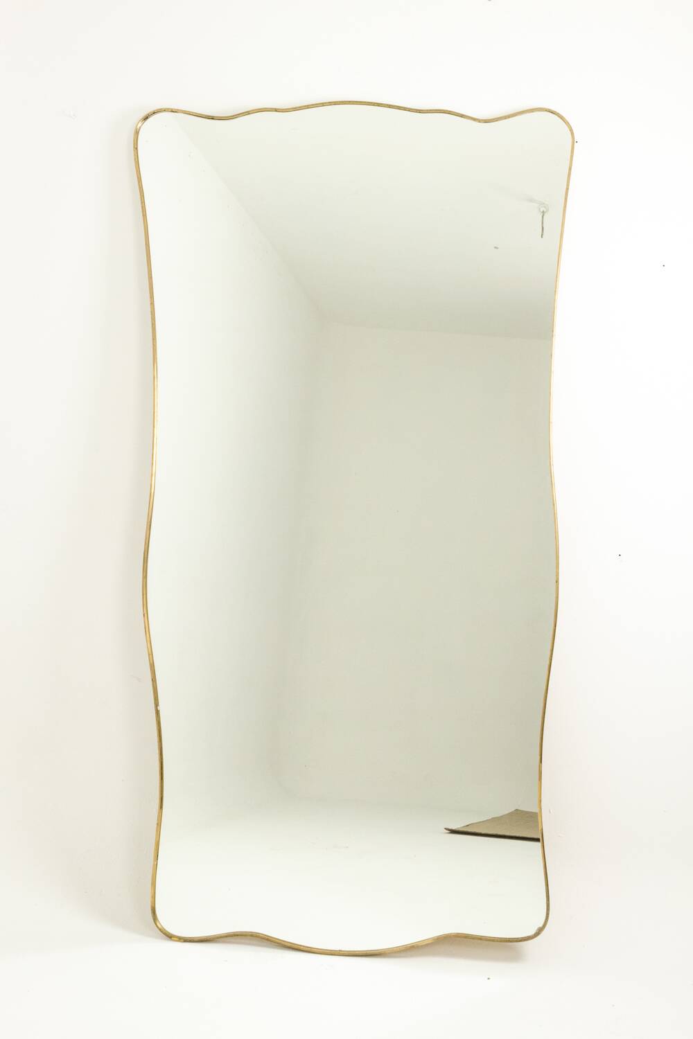 Mirror with a gilded brass frame. 1980s.