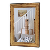 Miroir ancien en bois et stuc doré