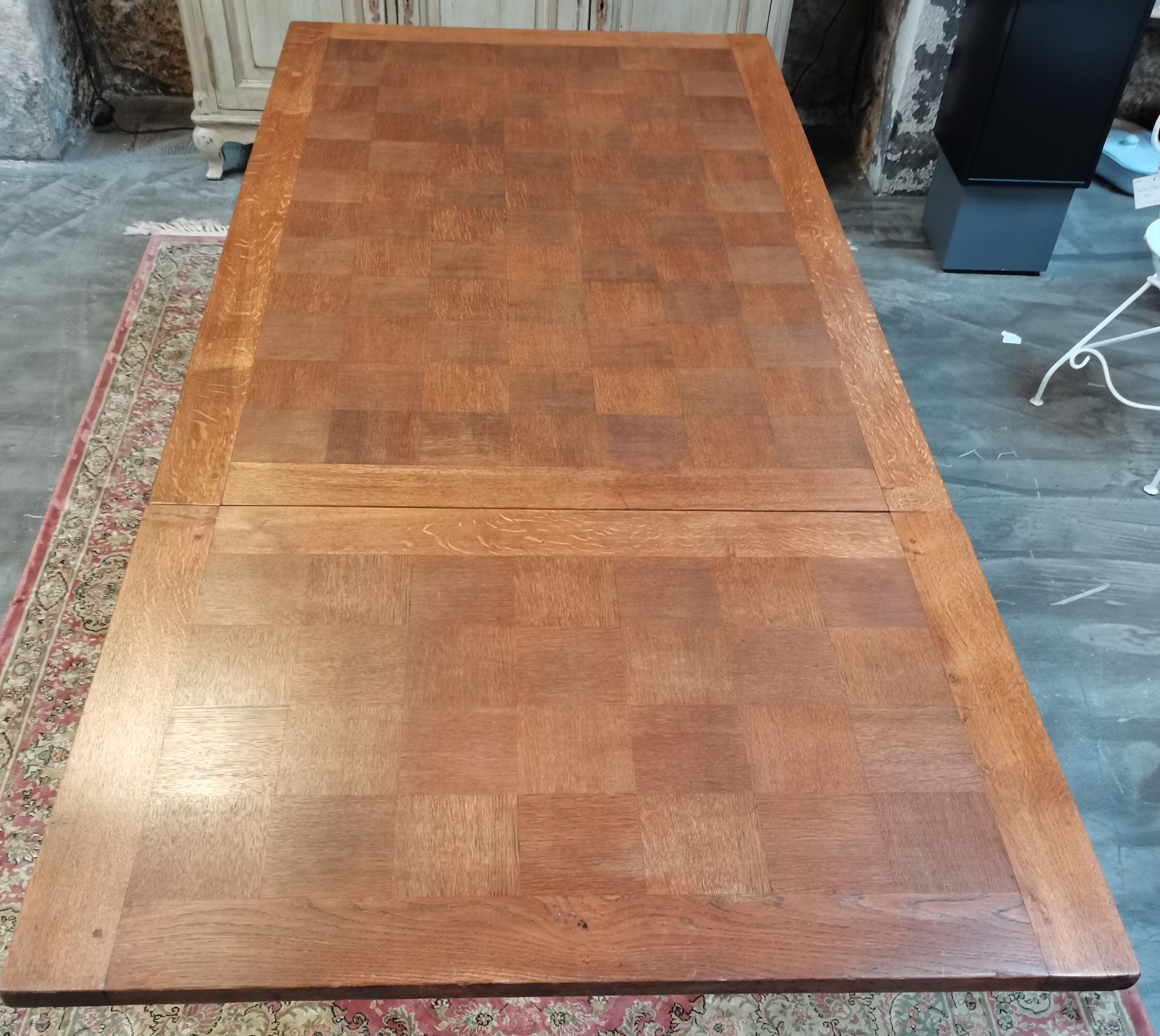 Old table in chene with extension cords