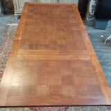 Old table in chene with extension cords