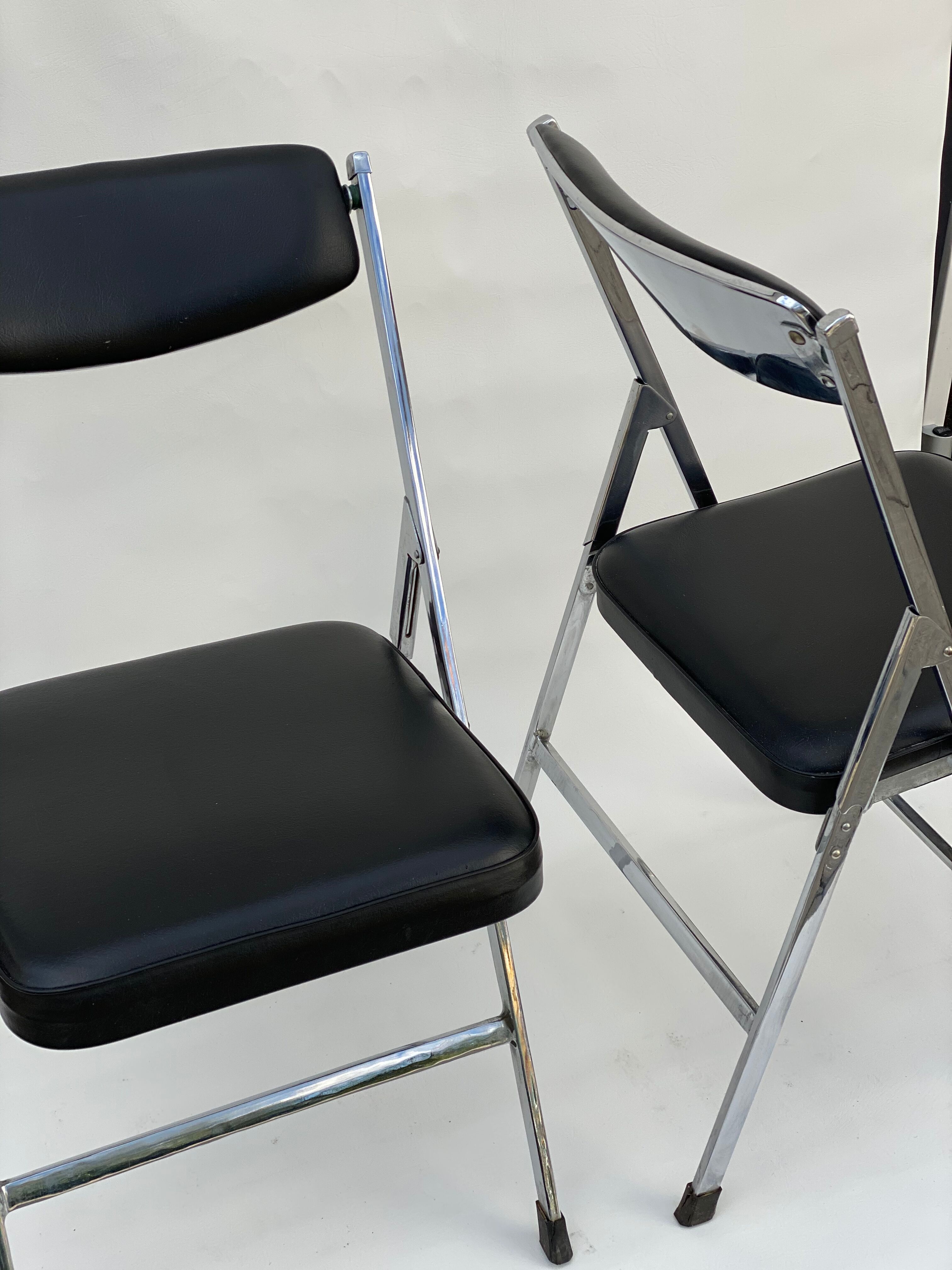 Pair of italian chrome and leather folding chairs