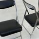 Pair of italian chrome and leather folding chairs