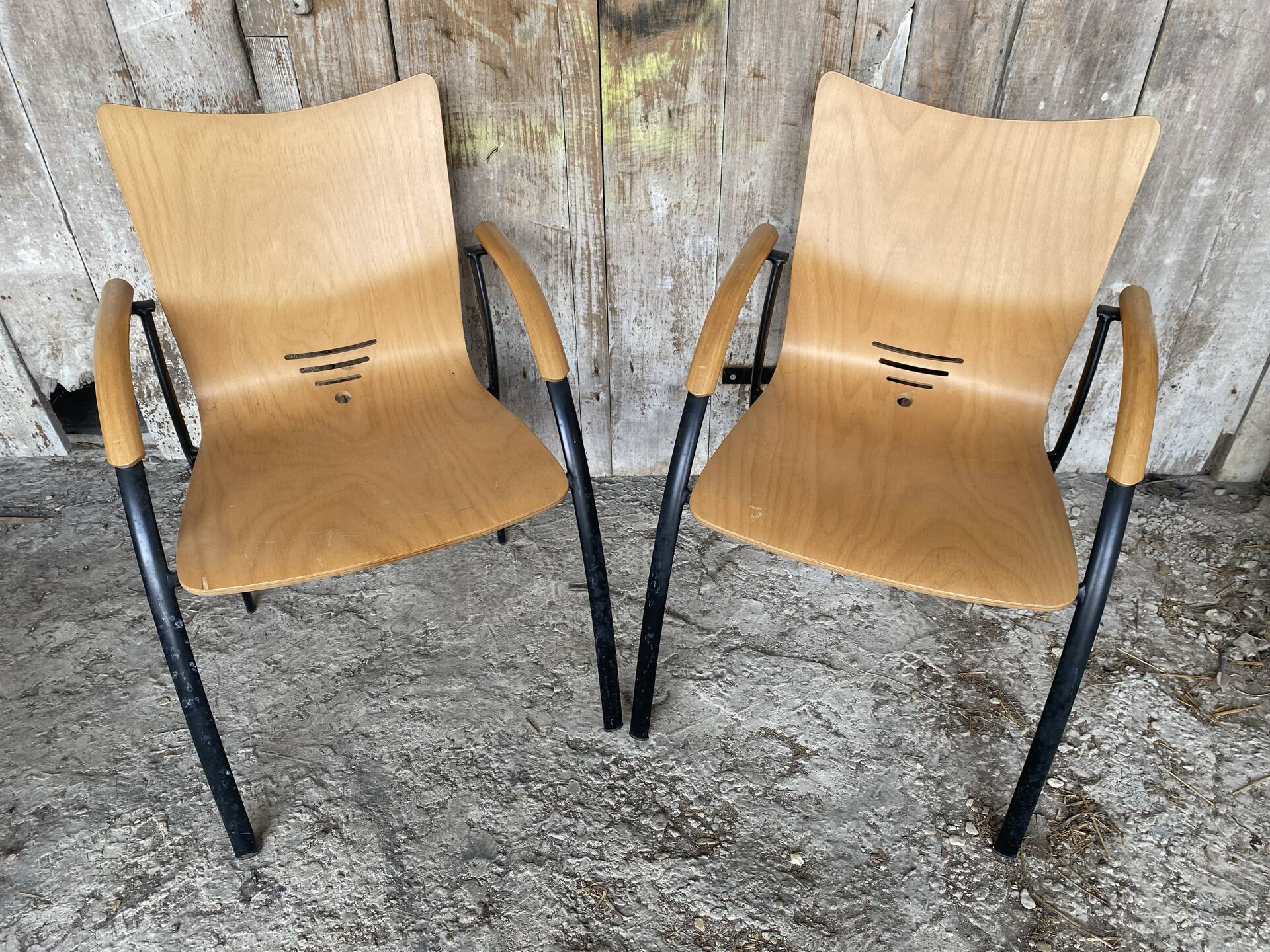 Pair of Vintage RONÉO Armchairs with Black Metal Legs + Curved Wooden Shell