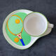 Tea/coffee cup and sport tennis saucer
