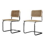 Set of 2 modern vintage Italian chairs in white wood and mid-century French wicker.