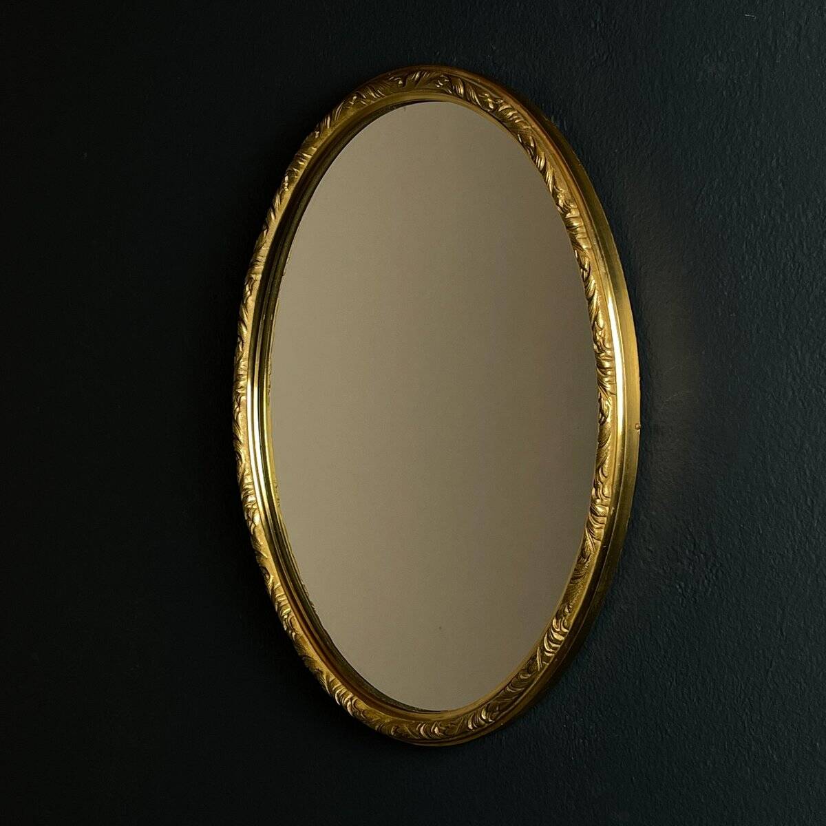 Vintage mirror in a brass frame, Italy, 1950s.