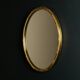 Vintage mirror in a brass frame, Italy, 1950s.