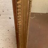 Louis XVI style mirror in wood and gilded stucco XIX century