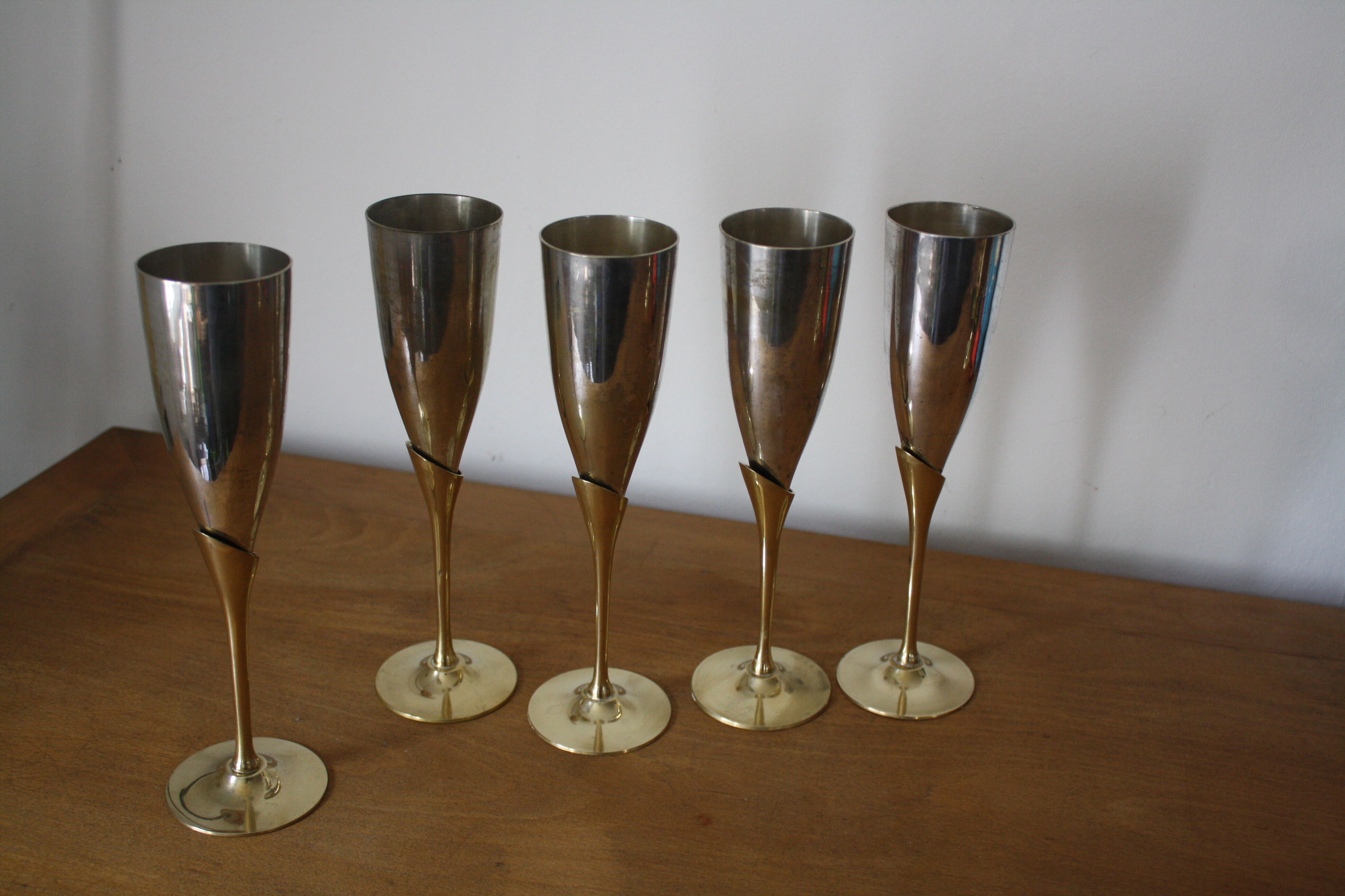 5 metal and brass champagne flutes