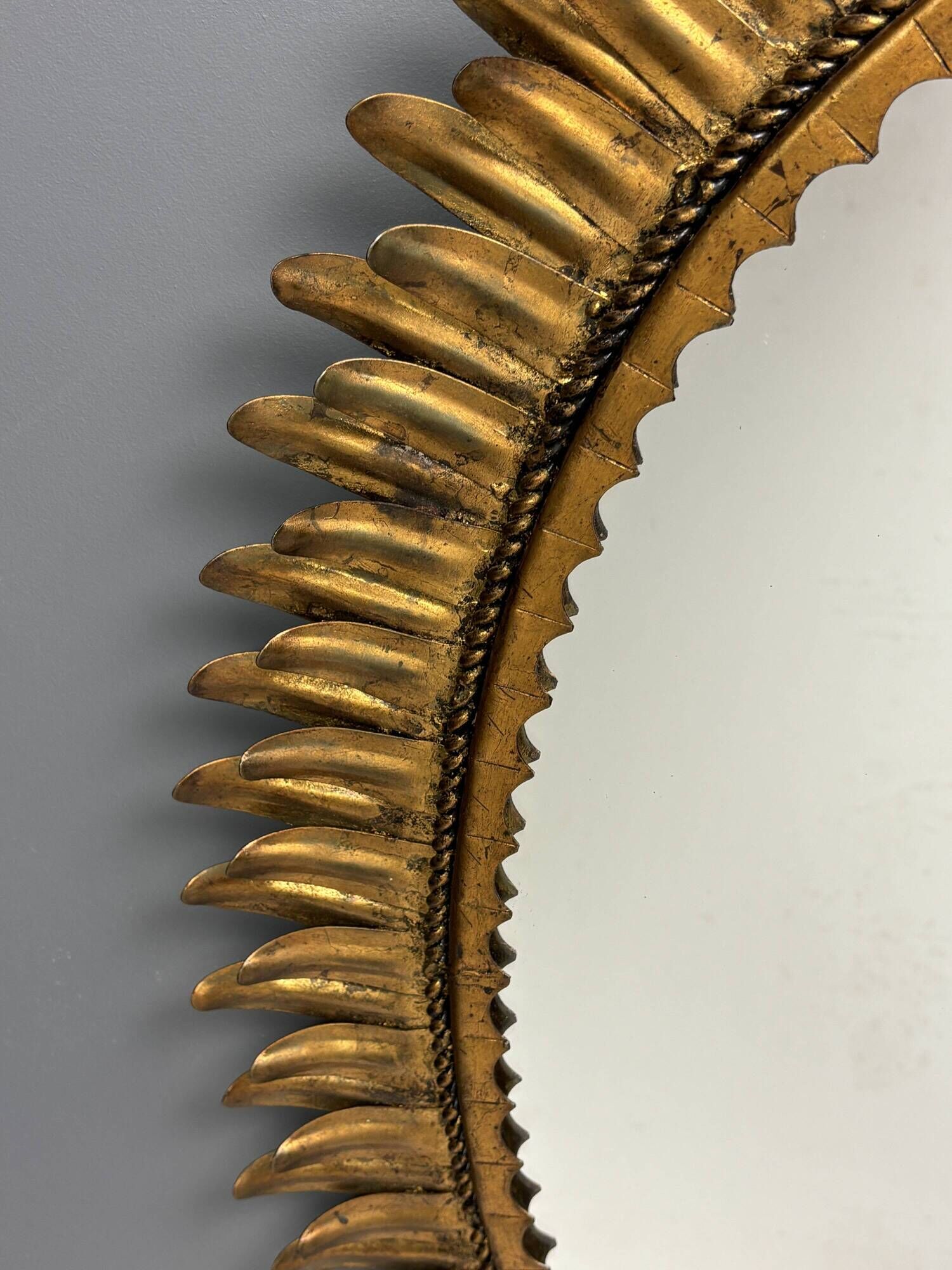 Midcentury bohemian Hollywood Regency Spanish gilt metal sun mirror, 1960s