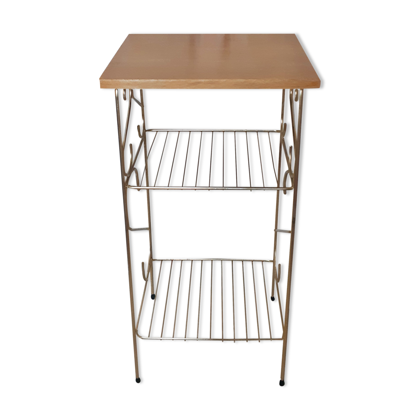 Side table with a golden magazine holder
