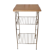 Side table with a golden magazine holder
