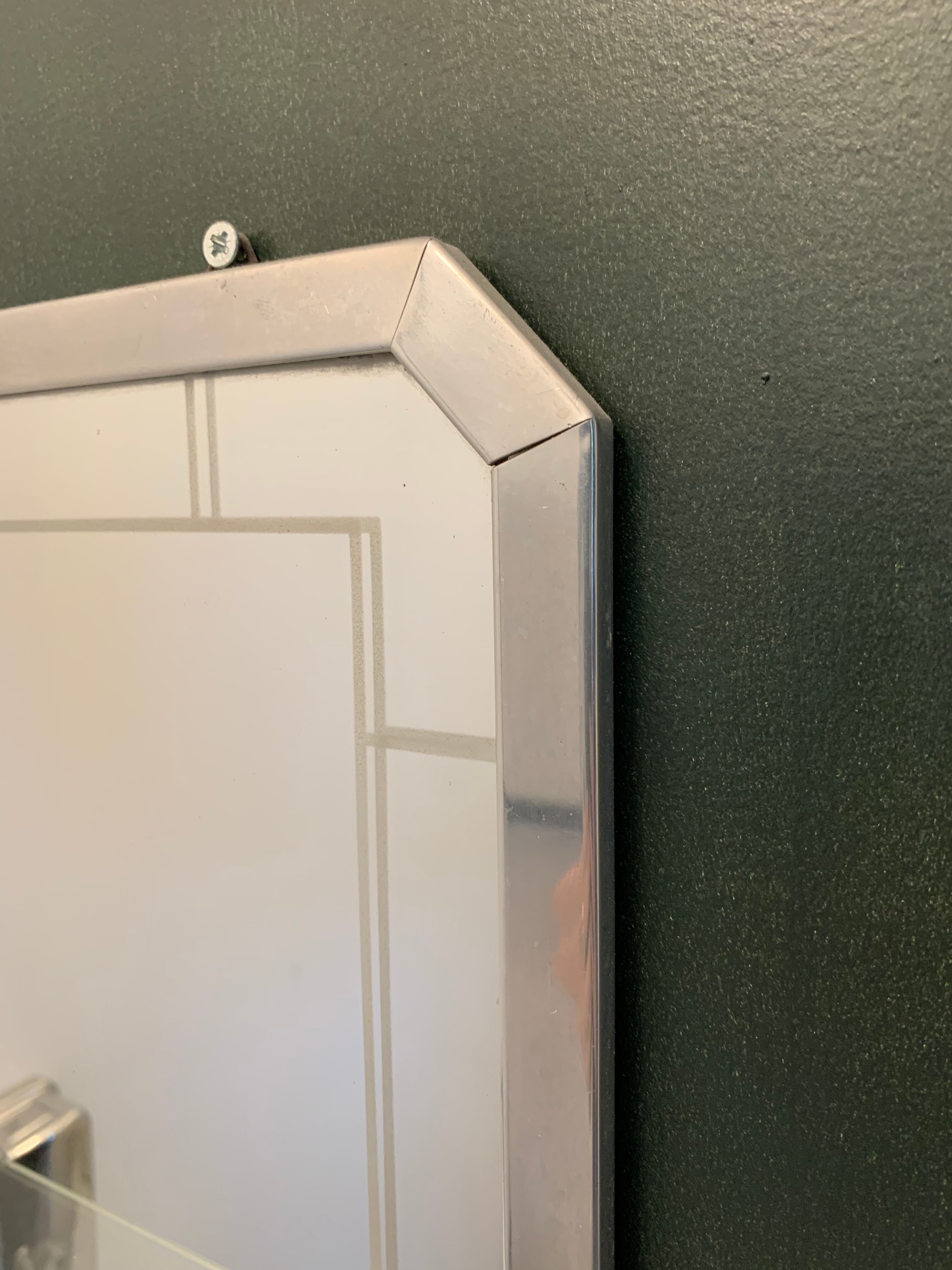 Bathroom mirror with art deco shelf
