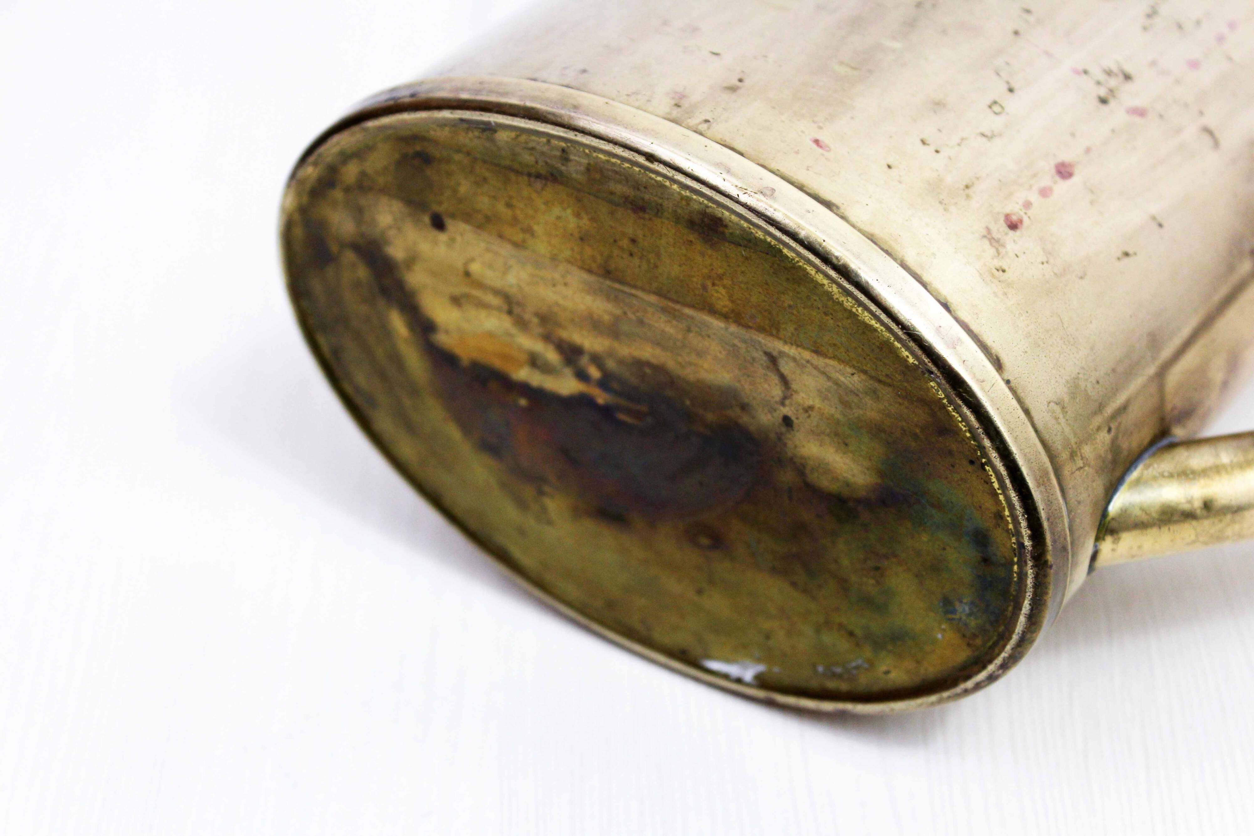 Vintage brass watering can